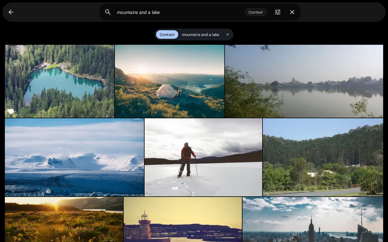 Smart search results for a query about mountains and a lake, with no manual tags