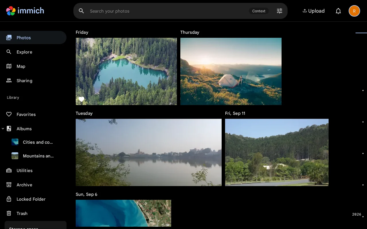 Immich timeline with photos grouped by date in dark theme